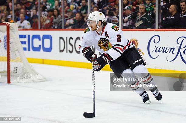 Duncan Keith of the Chicago Blackhawks controls the puck against the Minnesota Wild in Game Three of the Second Round of the 2014 NHL Stanley Cup...