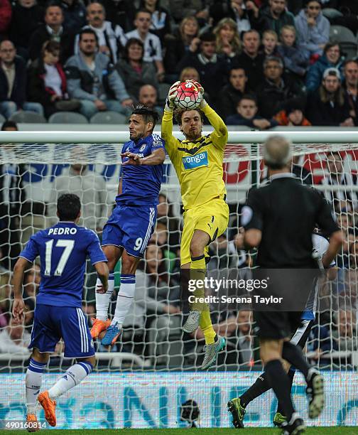 Newcastle Goalkeeper Tim Krul makes a flying save from Oscar of Chelsea during the Barclays Premier League match between Newcastle United and Chelsea...