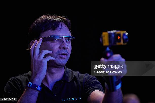 Member of the audience wearing Google Glass films the Q&A as Shuhei Yoshida, President of Sony's Worldwide Studios SCE, looks back at the launch of...