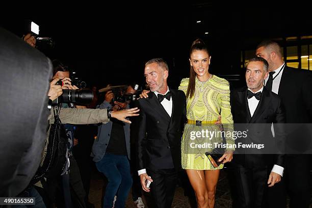 Alessandra Ambrosio, Dean Caten and Dan Caten arrive at amfAR Milano 2015 at La Permanente on September 26, 2015 in Milan, Italy.