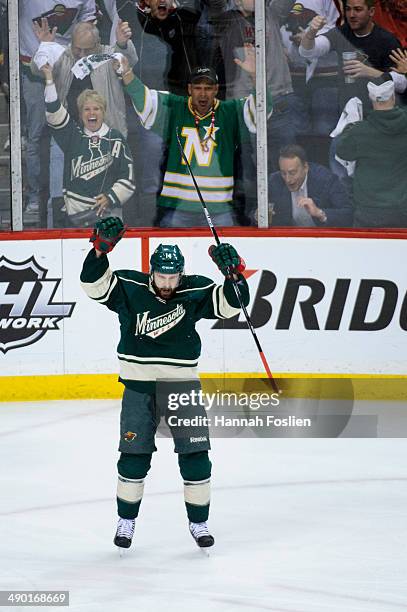 Justin Fontaine of the Minnesota Wild celebrates a scoring a goal against the Chicago Blackhawks in Game Four of the Second Round of the 2014 NHL...