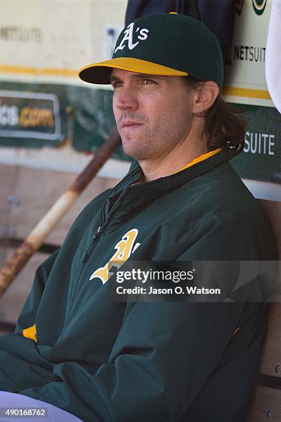 Barry Zito of the Oakland Athletics sits in the dugout during the fourth inning against the San Francisco Giants at O.co Coliseum on September 26,...