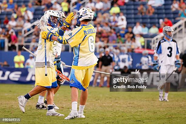 Casey Powell and Kieran McArdle of the Florida Launch celebrate after a goal during the first half of the game against the Ohio Machine at Florida...