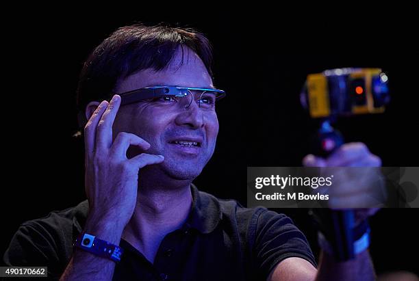 Member of the audience wearing Google Glass films the Q&A as Shuhei Yoshida, President of Sony's Worldwide Studios SCE, looks back at the launch of...