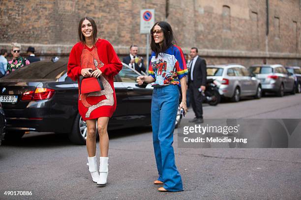 Diletta Bonaiuti and Gilda Ambrosio share a laught at Milan Fashion Week Spring/Summer 16 on September 26, 2015 in Milan, Italy. Diletta wears a red...