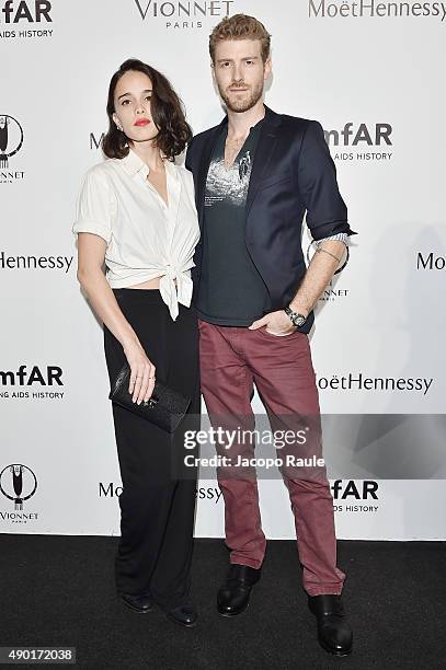 Chelsea Tyler and John Foster arrive at amfAR Milano 2015 at La Permanente on September 26, 2015 in Milan, Italy.