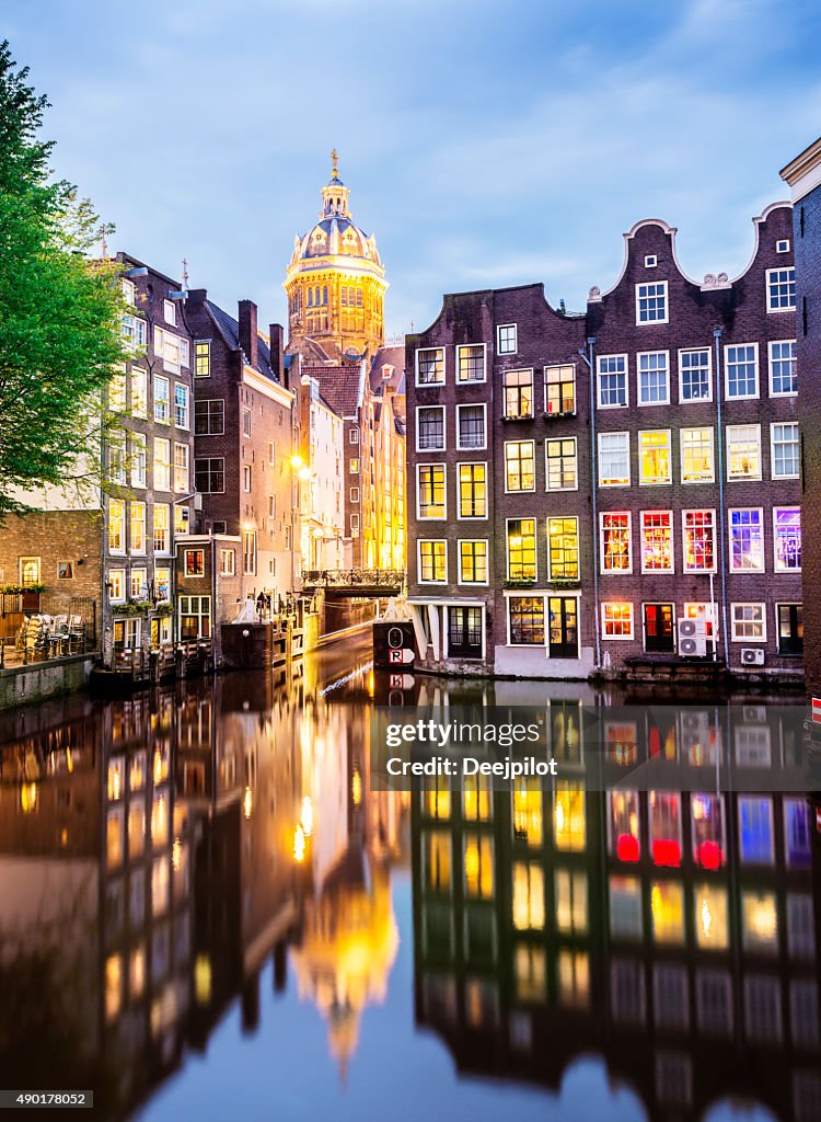 St Nicholas Church with Reflection in Amsterdam Canal Netherlands