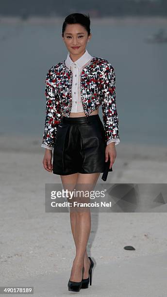 Zhou Xun attends the Chanel Cruise Collection 2014/2015 Photocall at The Island on May 13, 2014 in Dubai, United Arab Emirates.