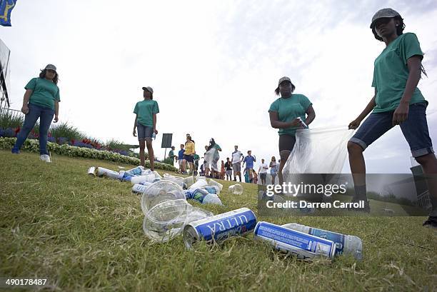 The Players Championship: View of grounds crew collecting trash after Saturday play at Stadium Course of TPC Sawgrass. Ponte Vedra Beach, FL...