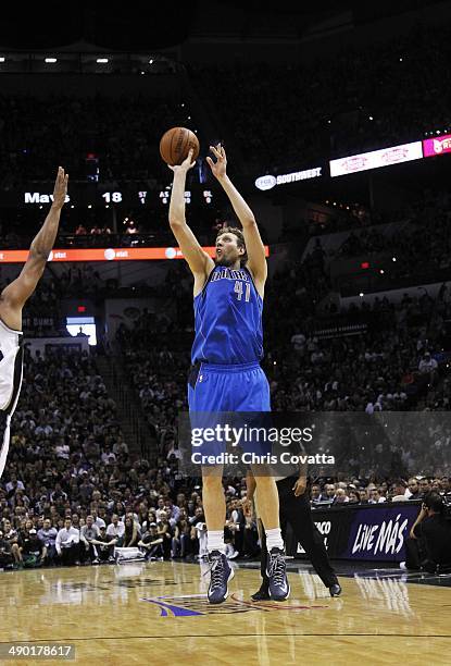 Dirk Nowitzki of the Dallas Mavericks shoots against the San Antonio Spurs in Game Seven of the Western Conference Quarterfinals during the 2014 NBA...