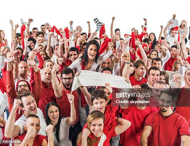 crowd of happy sport fans cheering and celebrating. - crowd cheering stock pictures, royalty-free photos & images