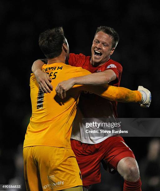 Jamie Jones and Nathan Clarke of Leyton Orient celebrate after victory in the Sky Bet League One play-off second leg semi-final match between Leyton...