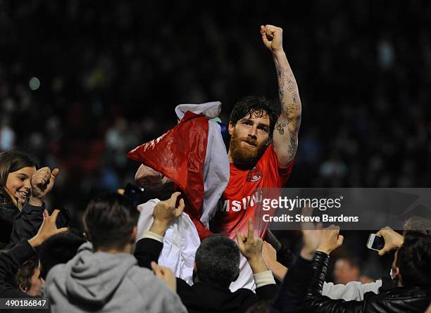 Romain Vincelot of Leyton Orient celebrates with the supporters after victory in the Sky Bet League One play-off second leg semi-final match between...