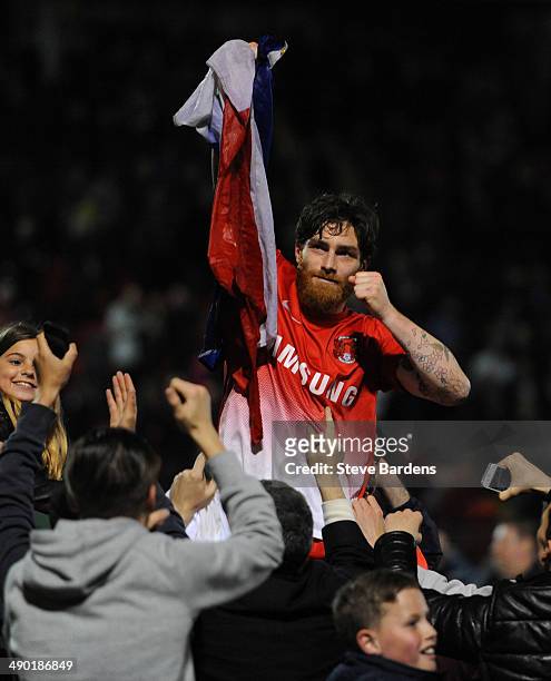 Romain Vincelot of Leyton Orient celebrates with the supporters after victory in the Sky Bet League One play-off second leg semi-final match between...