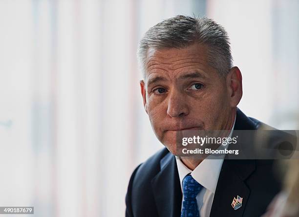 Russell "Russ" Girling, president and chief executive officer of TransCanada Corp., listens during the Bloomberg Economic Summit in Toronto, Ontario,...