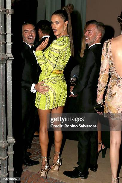 Dean Catern, Alessandra Ambrosio and Dan Caten arrive at amfAR Milano 2015 at La Permanente on September 26, 2015 in Milan, Italy.