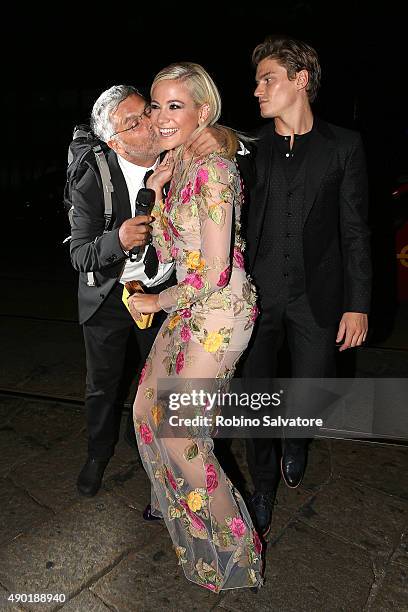 Pixie Lott and Oliver Cheshire arrive at amfAR Milano 2015 at La Permanente on September 26, 2015 in Milan, Italy.