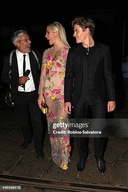 Pixie Lott and Oliver Cheshire arrive at amfAR Milano 2015 at La Permanente on September 26, 2015 in Milan, Italy.