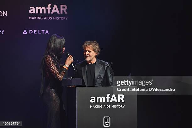 Renzo Rosso and Naomi Campbell attend the amfAR Milano 2015 after party at La Permanente on September 26, 2015 in Milan, Italy.