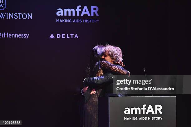 Renzo Rosso and Naomi Campbell attend the amfAR Milano 2015 after party at La Permanente on September 26, 2015 in Milan, Italy.