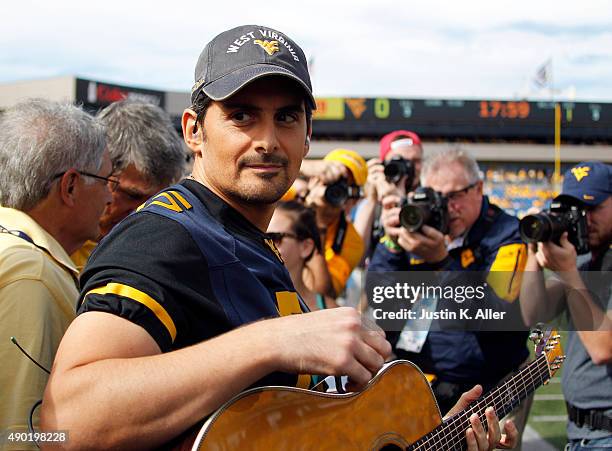 Brad Paisley looks on from the sideline before the game between the West Virginia Mountaineers and the Maryland Terrapins on September 26, 2015 at...