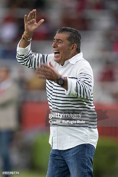 Carlos Reinoso coach of Veracruz reacts during a 10th round match between Atlas and Veracruz as part of the Apertura 2015 Liga MX at Jalisco Stadium...