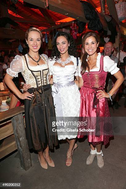 Sabine Lisicki, Lilly Becker wearing a Claudia Effenberg dirndl, Karen Webb during the Oktoberfest 2015 at Kaeferschaenke at Theresienwiese on...