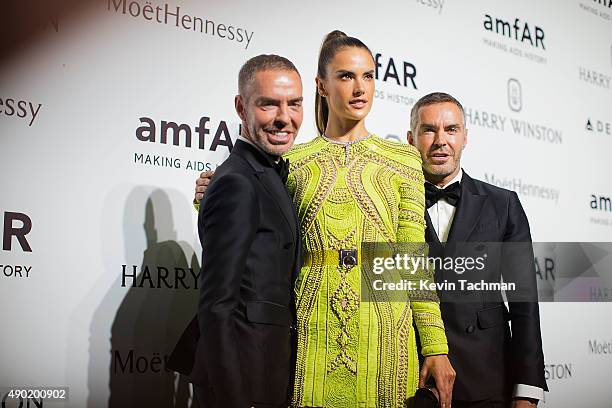 Dean Catern, Alessandra Ambrosio and Dan Caten attends amfAR Milano 2015 at La Permanente on September 26, 2015 in Milan, Italy.