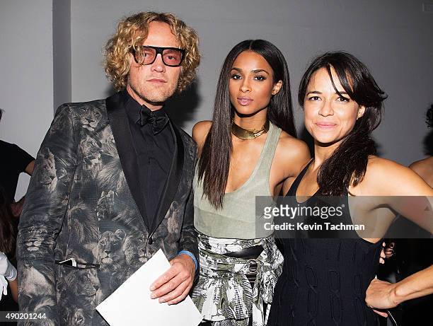 Peter Dundas, Ciara and Michelle Rodriguez attend amfAR Milano 2015 at La Permanente on September 26, 2015 in Milan, Italy.