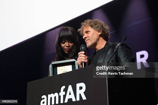 Naomi Campbell and Renzo Rosso are seen at amfAR Milano 2015 at La Permanente on September 26, 2015 in Milan, Italy.