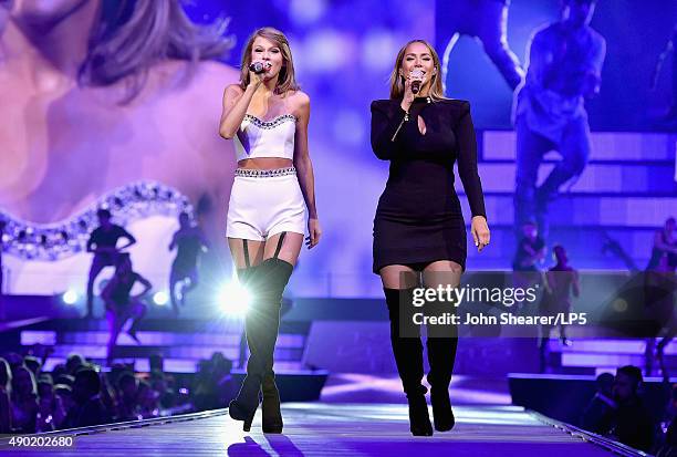 Singer/songwriters Taylor Swift and Leona Lewis perform onstage during The 1989 World Tour live in Nashville at Bridgestone Arena at Bridgestone...