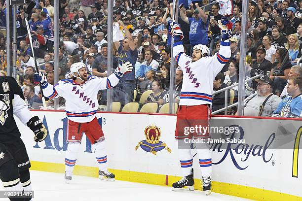 Dominic Moore of the New York Rangers, left, and Brian Boyle of the New York Rangers celebrate after Boyle scored a goal against the Pittsburgh...