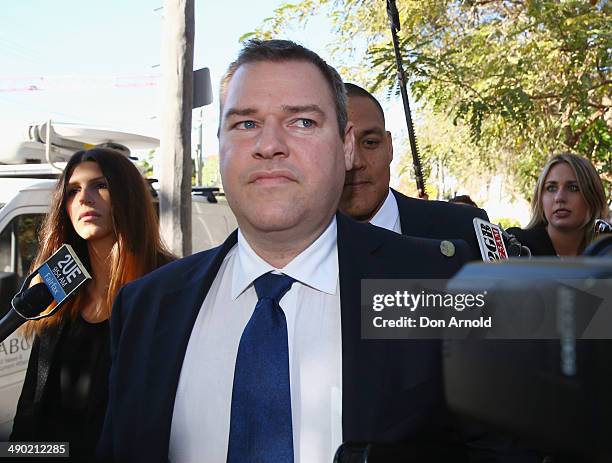 Geoff And Sara Huegill arrive at Waverley Court to face charges relating to possession of a prohibited substance on May 14, 2014 in Sydney,...