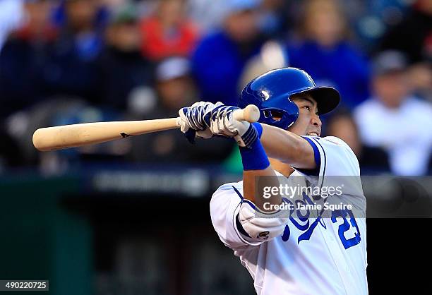 Norichika Aoki of the Kansas City Royals connects during the 2nd inning of the game against the Colorado Rockies at Kauffman Stadium on May 13, 2014...