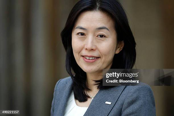 Teiko Kudo, director at Sumitomo Mitsui Banking Corp., poses for a photograph outside the company's headquarters in Tokyo, Japan, on Friday, April...
