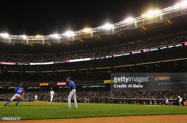 David Wright of the New York Mets drives in Eric Young Jr. #22 against Alfredo Aceves of the New York Yankees in the fourth inning during their game...