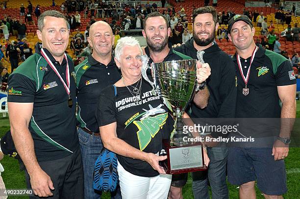 Ben Walker, Chris Walker and Shane Walker pose for a photo with father Gary Walker and mother Trish Walker after the Queensland Cup Rugby League...