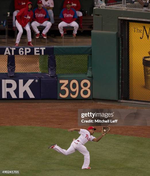 Center fielder Ben Revere of the Philadelphia Phillies makes a diving catch in the top of the fourth inning against the Los Angeles Angels of Anaheim...