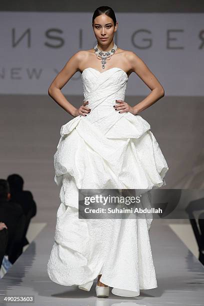 Model showcases design by Rubin Singer during the Audi Red Carpet Night at Tent at Orchard on May 13, 2014 in Singapore