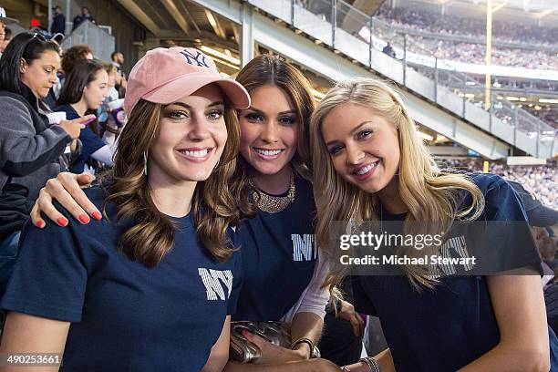 Miss USA 2013 Erin Brady, Miss Universe 2013 Gabriela Isler and Miss Teen USA 2013 Cassidy Wolf seen at the New York Mets vs New York Yankees game on...