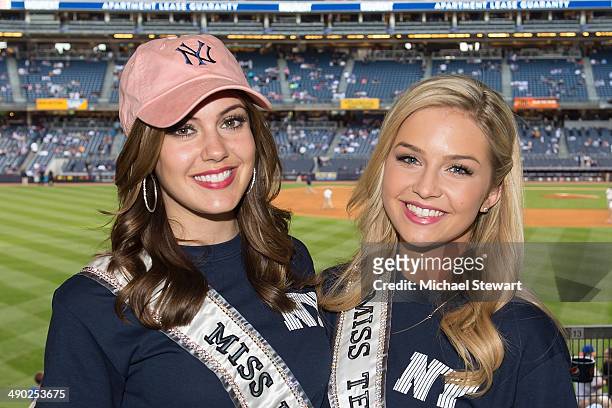 Miss USA 2013 Erin Brady and Miss Teen USA 2013 Cassidy Wolf seen at the New York Mets vs New York Yankees game on May 13, 2014 in New York City.