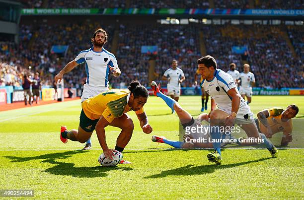 Joseph Tomane of Australia scores their second try during the 2015 Rugby World Cup Pool A match between Australia and Uruguay at Villa Park on...