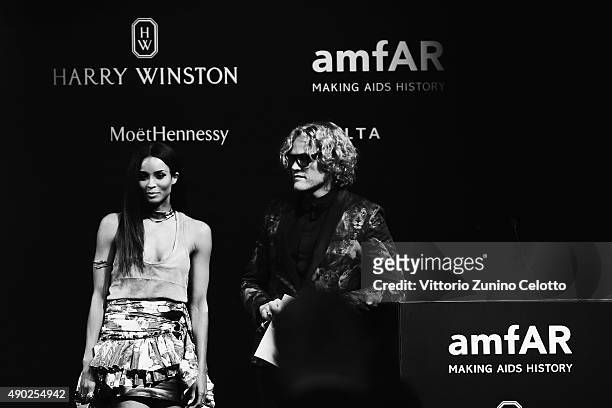 An alternative view of Ciara and Peter Dundas at amfAR Milano 2015 at La Permanente on September 26, 2015 in Milan, Italy.