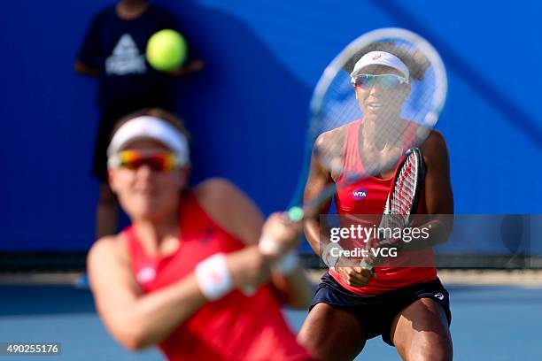 Abigail Spears and Raquel Kops-Jones of the United States in action during a match against Sara Errani and Francesca Schiavone of Italy in the first...