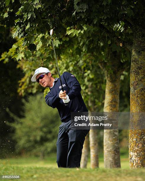 Mikko Ilonen of Finland hits out of the rough on hole 3 during the final round of the Porsche European Open at Golf Resort Bad Griesbach on September...