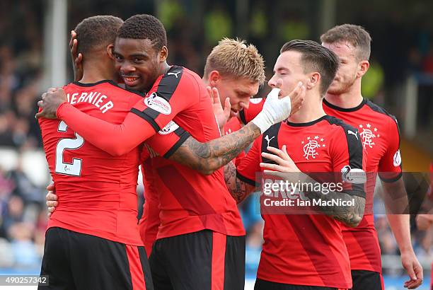 James Tavernier of Rangers celebrates after he scores Rangers third goal with Nathan Oduwa of Rangers during the Scottish Championships match between...