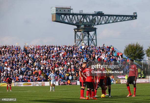 Rangers players prepare to take a free kick with the Titan Crane in the back ground during the Scottish Championships match between Greenock Morton...