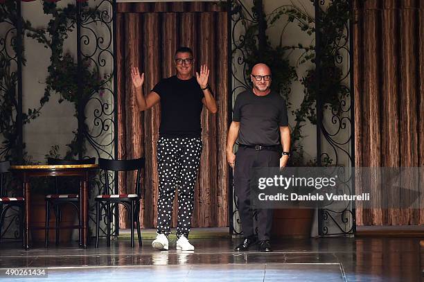 Designer Stefano Gabbana and Domenico Dolce aknowledge the applause of the public after the Dolce & Gabbana show as a part of Milan Fashion Week...