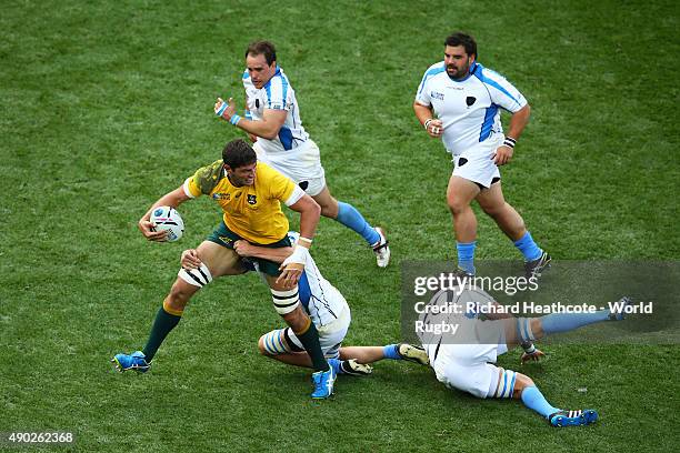 Rob Simmons of Australia attempts break through the Uruguay defence during the 2015 Rugby World Cup Pool A match between Australia and Uruguay at...