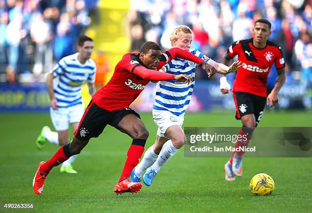 Frank McKeown of Greenock Morton vies with Nathan Oduwa of Rangers during the Scottish Championships match between Greenock Morton FC and Rangers at...